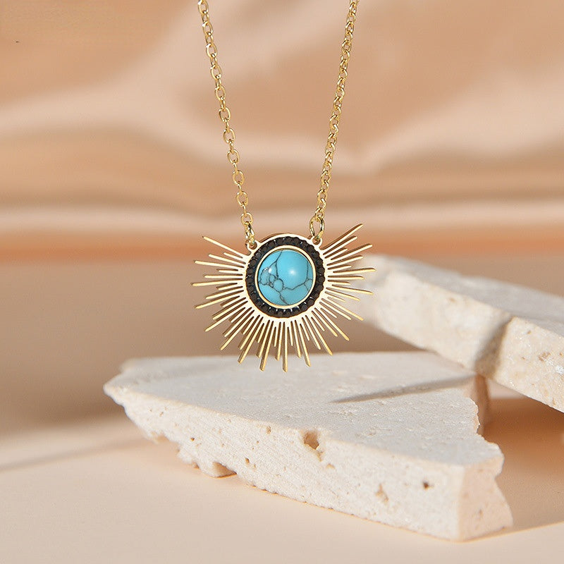 Venta al por mayor Collar colgante de turquesa de girasol de acero de titanio